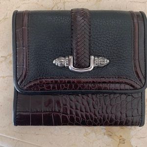 Brighton trifold wallet. Brown embossed alligator with black panel on front